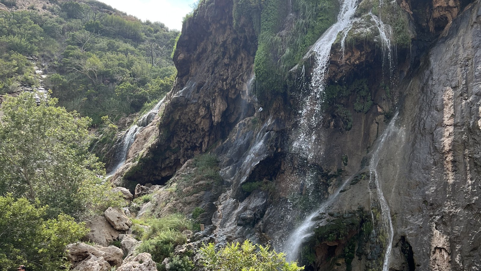 Sitting Bull Falls Sitting Bull Falls dropping over pale limestone into a desert canyon pool